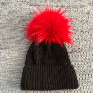 Cozy Black Knit Hat with Red Pom Pom